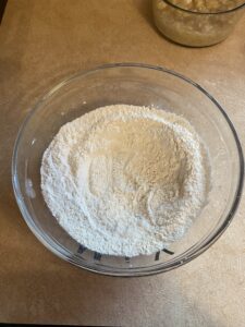 Making a well in flour mixture